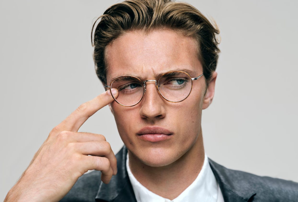 man wearing oliver peoples